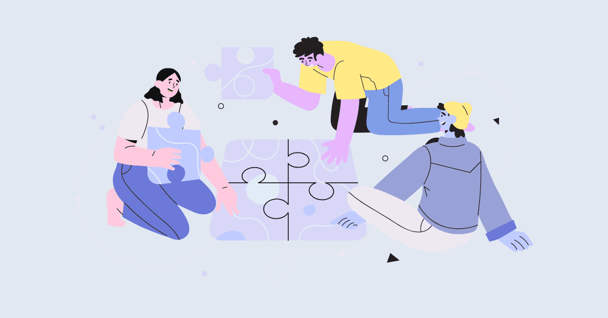 Cartoon image of a diverse group of colleagues putting together a large puzzle