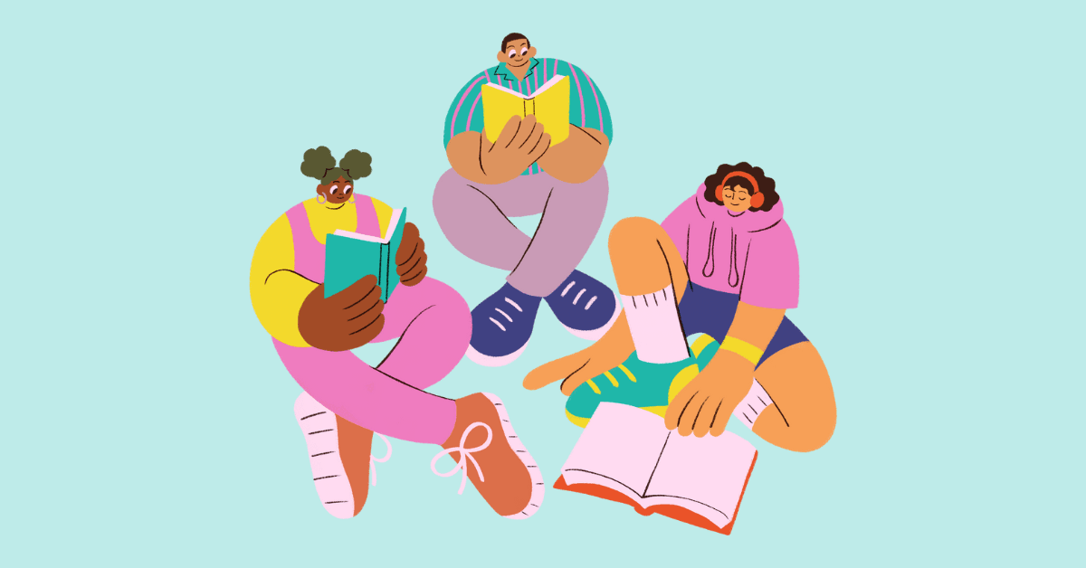 Coworkers reading books on diversity and inclusion